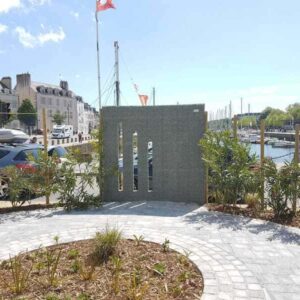 Aménagement extérieur avec un mur en gravillon